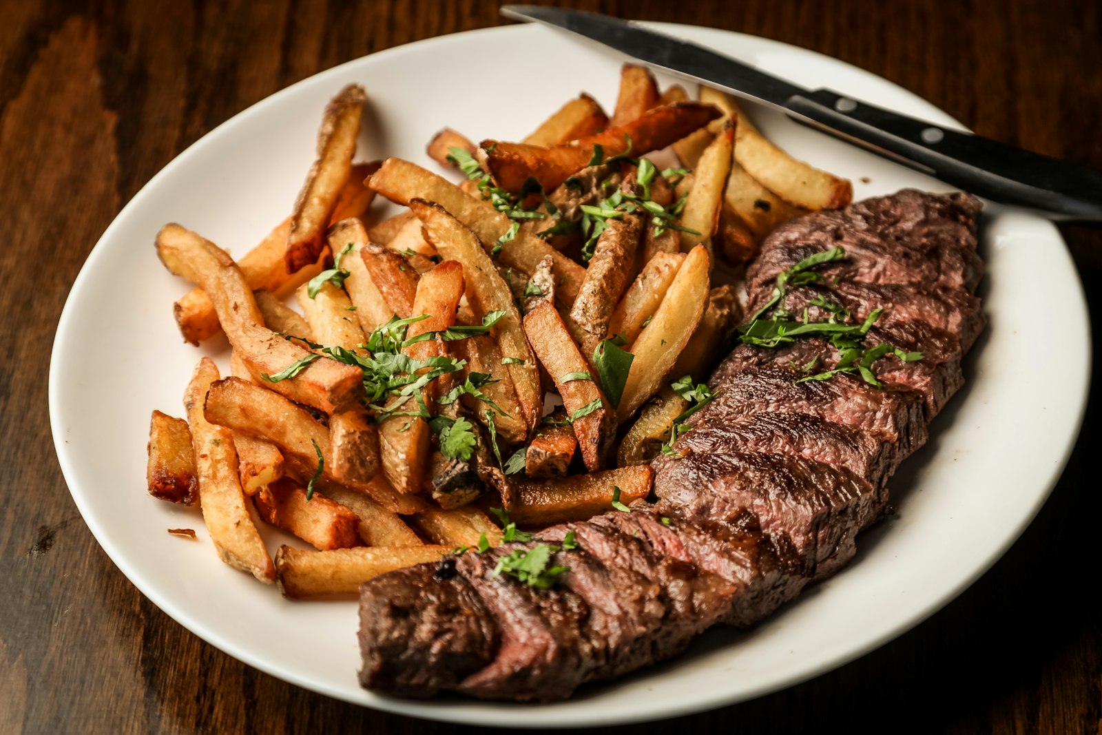 Steak with chimichurri and crispy chips
